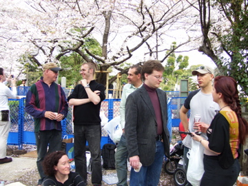 hanami revelers in the foreign section of Aoyama cemetery